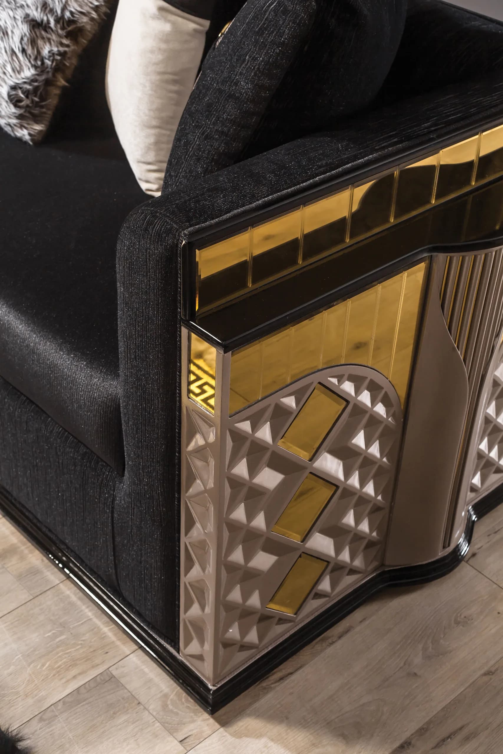 Diamond-facet inlay and brushed gold banding on a Valencia cabinet front